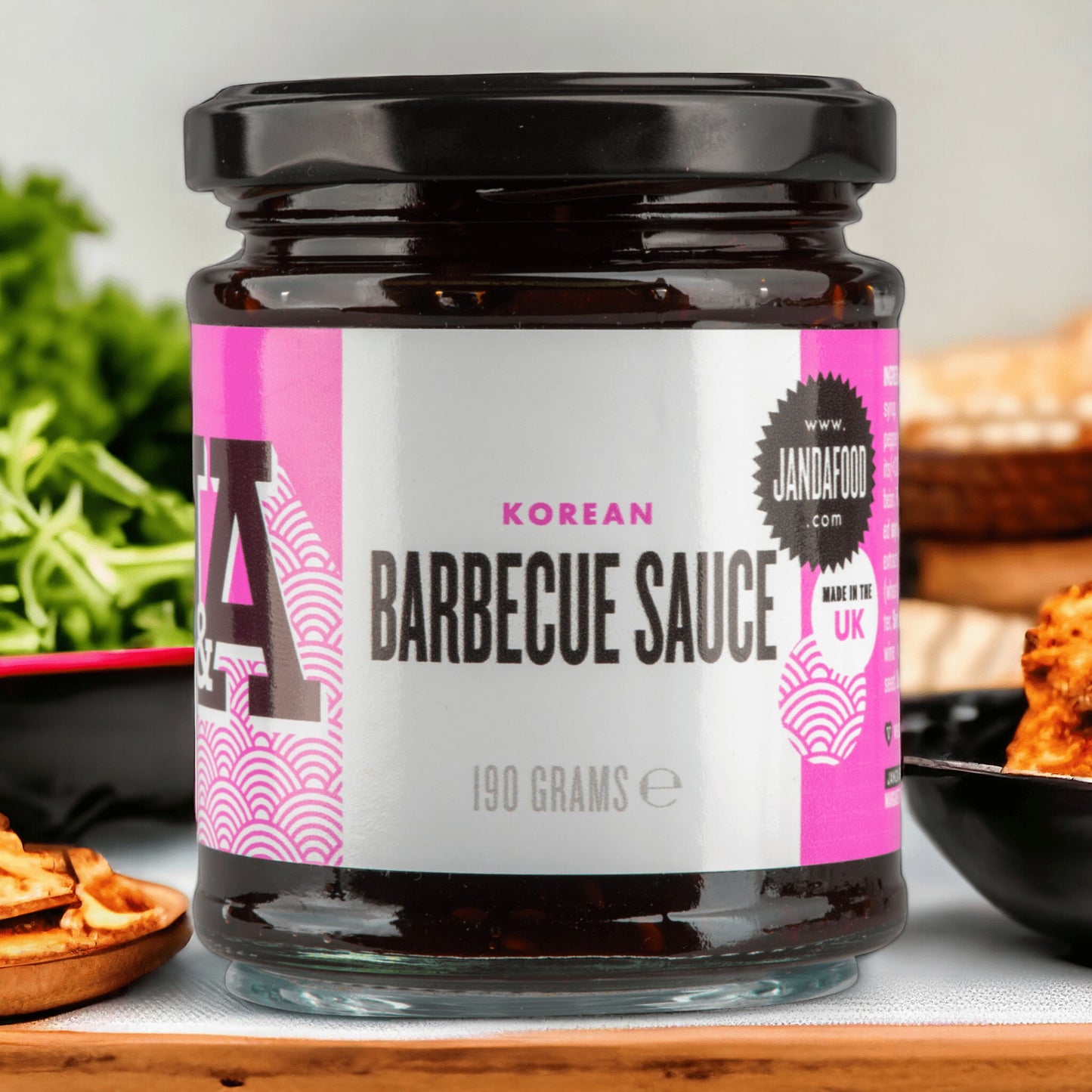 Janda Food Korean Barbecue Sauce in a glass jar with a pink and white label featuring Gochujang chilli paste