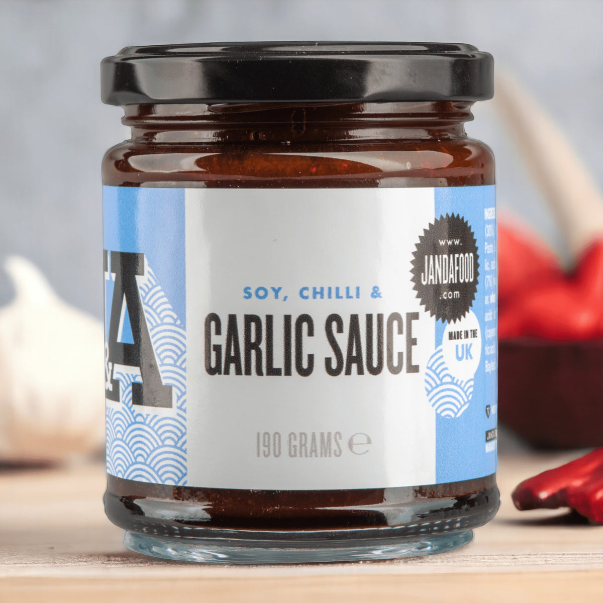 Janda Food handmade vegan soy chilli and garlic sauce in a glass jar, inspired by Filipino Adobo flavours.