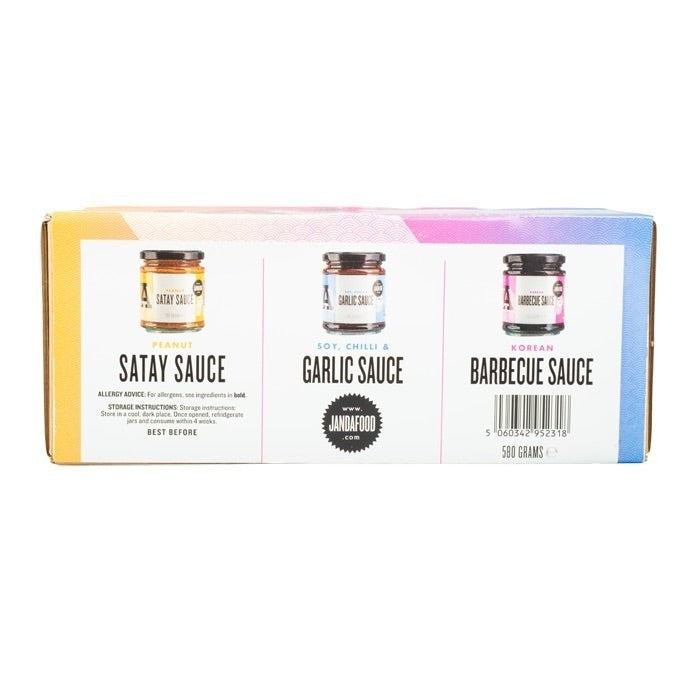 Janda Food Taste of Asia gift box featuring three glass jars of satay, soy chilli garlic, and Korean barbecue sauces.
