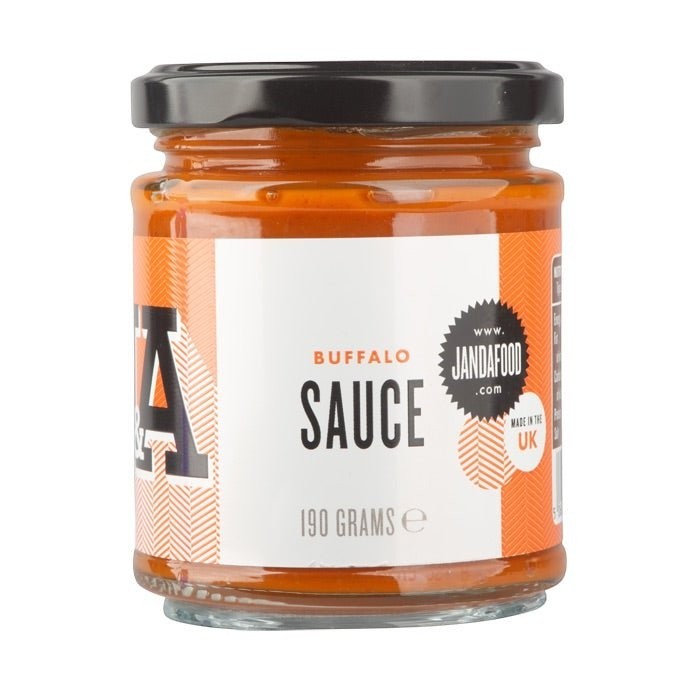 Janda Food vegan buffalo sauce in a glass jar with a white label, made in the UK with aged jalapeños.