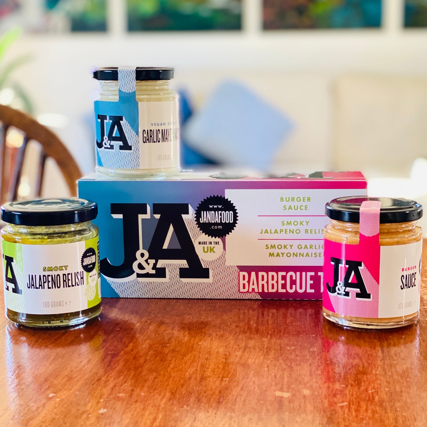 Elevate your grilling with the Janda Barbecue Trio - a tantalizing gift box featuring smoky sauces. Perfect for foodies and keen cooks.